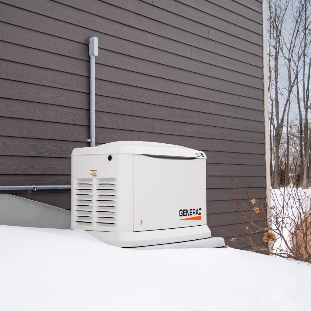 Generac home generator in the snow.