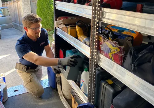 CrewPros employee grabbing tools.