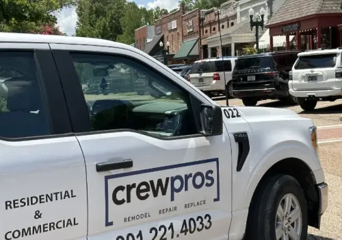 CrewPros truck driving through Collierville.